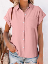 A soft pink cuffed short sleeve shirt with collar and chest pocket ideal for casual and formal wear
