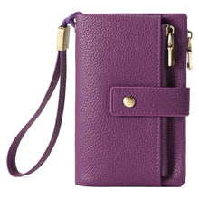 Purple textured leather wristlet wallet with gold zipper pulls and strap