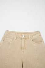 Beige high-waisted solid color seamed denim jeans with center wide leg and subtle stitching details