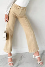 Beige solid color seamed wide leg cropped denim jeans with color seamed center and rolled cuffs
