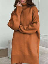Cozy rust-orange turtleneck drop shoulder loose sweater dress with ribbed cuffs