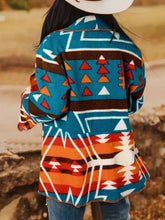 Southwestern collared neck long sleeve jacket in teal, orange, brown geometric patterns