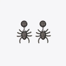 Spider rhinestone alloy earrings with pavé gemstones and pearl accents