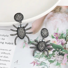 Pair of black spider rhinestone alloy earrings with sparkling dangles