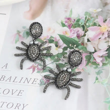 Pair of dark gray spider rhinestone alloy earrings with faux pearls