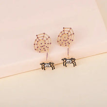 Spider rhinestone alloy earrings with purple and black gemstone spiders