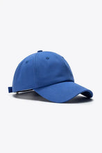 Solid blue baseball cap with curved brim and adjustable strap for sports lovers