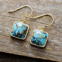 Square copper drop earrings with gold frames and mottled blue brown stones
