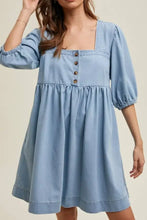 Light blue denim dress with puffed sleeves and square neck half design, machine wash cold recommended