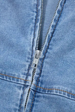 Blue denim dress with square neck wide straps featuring a silver metal zipper pull tab detail