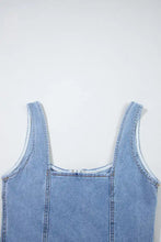 Light blue denim dress with square neck wide strap and thin straps made from denim material