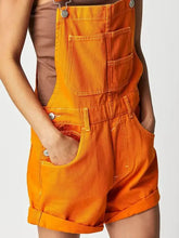 Square neck wide strap denim overalls in orange with pockets and rolled cuffs