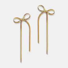 Stainless steel bow earrings with long wavy chains and gold thread bow