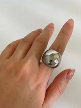 Silver stainless steel bubble statement ring with polished dome and clear stone