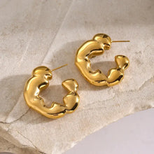 Shiny stainless steel abstract gold-colored C-hoop earrings pair