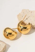 Gold textured stainless steel crescent hoop earrings with polished finish