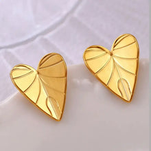 Golden stainless steel heart leaf stud earrings with vein design