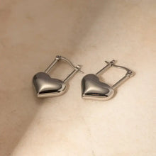 Polished stainless steel heart lock drop earrings