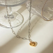 Stainless steel heart pendant necklace with 18k gold-plated chain
