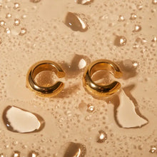 Two polished 18k gold-plated stainless steel letter C shape clip ear cuffs