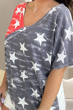 Woman in Star Surplice Short Sleeve T-Shirt with distressed American flag pattern
