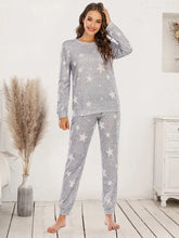 Gray star patterned loungewear set with soft textured fabric featuring top and pants for comfortable wear