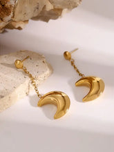 Brincos pendentes em aço com lua, com crescente dourado e gotas em corrente