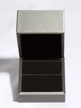 Sterling silver bow ring in minimalist silver box with black interior