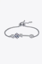 Sterling silver bracelet with large central 1 carat moissanite stone and pavé leaf accents