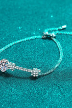 Sterling silver bracelet with pink gemstones, clear crystals, and carat moissanite accents