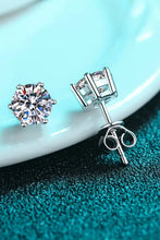 Sterling silver classic stud earrings with moissanite gem center