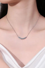 Sterling silver curved length pendant necklace with sparkling moissanite