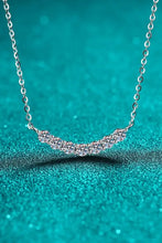 Sterling silver curved length pendant necklace with sparkling diamonds