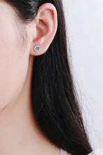 Womans ear with sparkling sterling silver diamond stud earring, limited warranty included