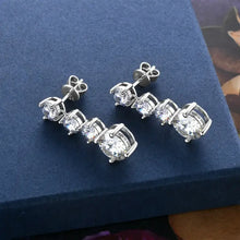 Sterling silver earrings with 1 carat moissanite cubic zirconia studs