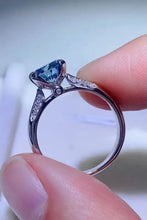 18k white gold diamond ring with blue sapphire, in sterling silver matching box