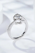 Sterling silver engagement ring with diamond heart bezel and pavé accents