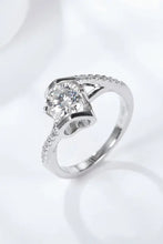 Sterling silver engagement ring with diamond heart bezel and pavé accents