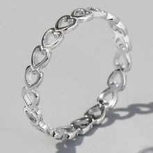 Sterling silver heart link ring with open interlocking design