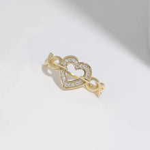 Gold-toned sterling silver heart ring with pavé-set diamond heart motif