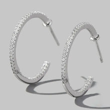 Sterling silver hoop earrings with pave diamonds and cubic zirconia