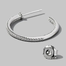 Sparkling sterling silver hoop earrings with pave cubic zirconia and diamonds