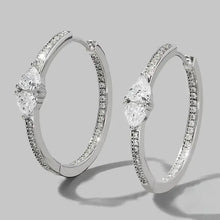 Sterling silver hoop earrings with inlaid zircon and pavé diamonds