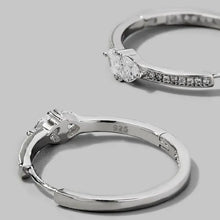Sterling silver hoop earrings with pear-cut inlaid zircon and pavé accents
