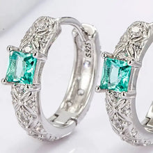 Sterling silver hoop earrings with teal gemstone and filigree detailing