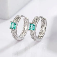 Sterling silver hoop earrings with square teal gemstones and filigree detailing
