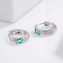 Sterling silver hoop earrings with square teal gemstone and filigree detailing