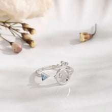 Sterling silver inlaid zircon ring with blue gemstone crown design