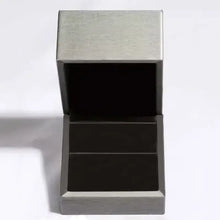 Sterling silver inlaid zircon ring on minimalist silver jewelry box