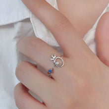 Sterling silver inlaid zircon ring with crown and blue gemstone